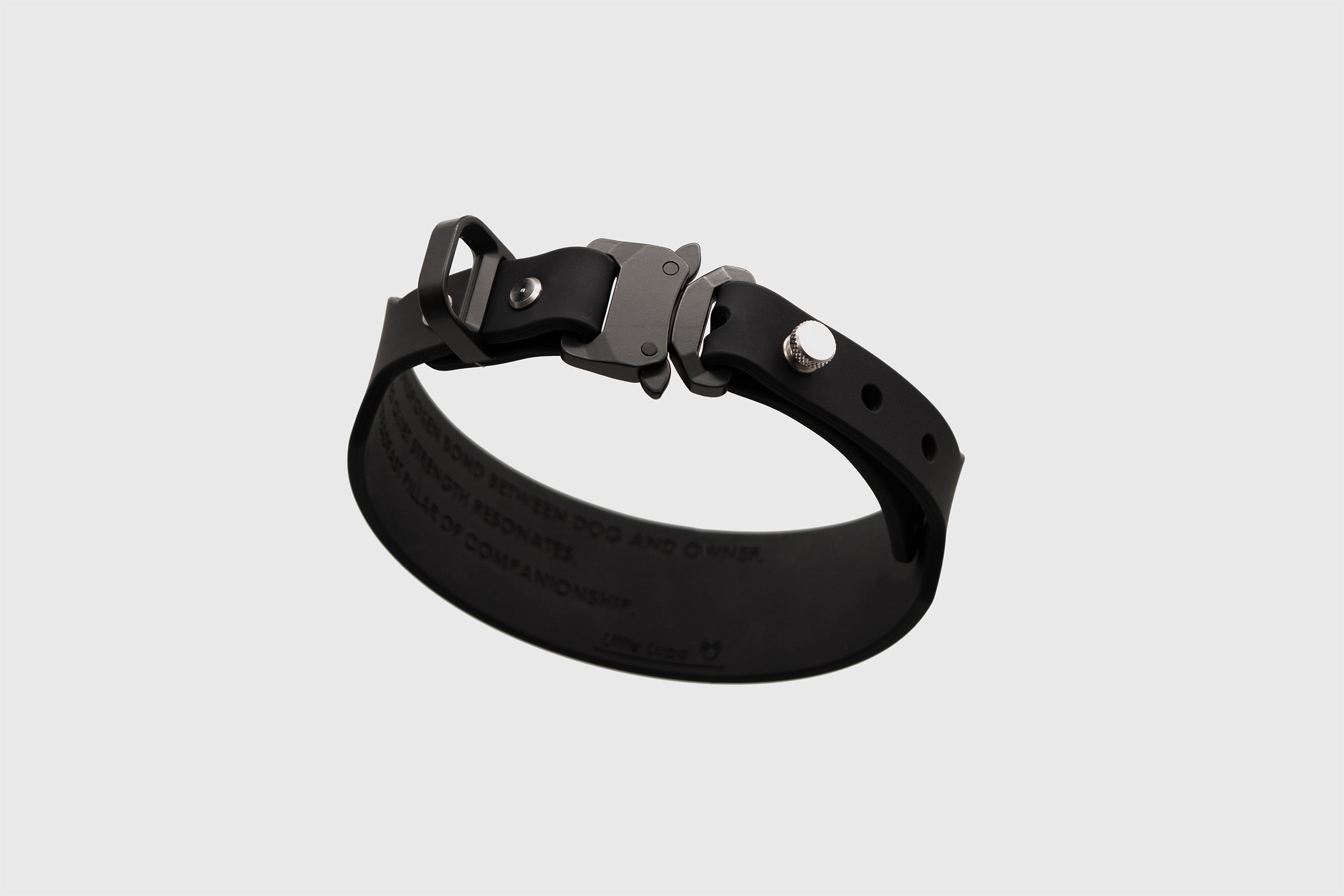Little Lupo Collar C2, a black tactical dog collar made from premium LFGB silicone, showcasing its rugged resilience and sleek design on a light background.