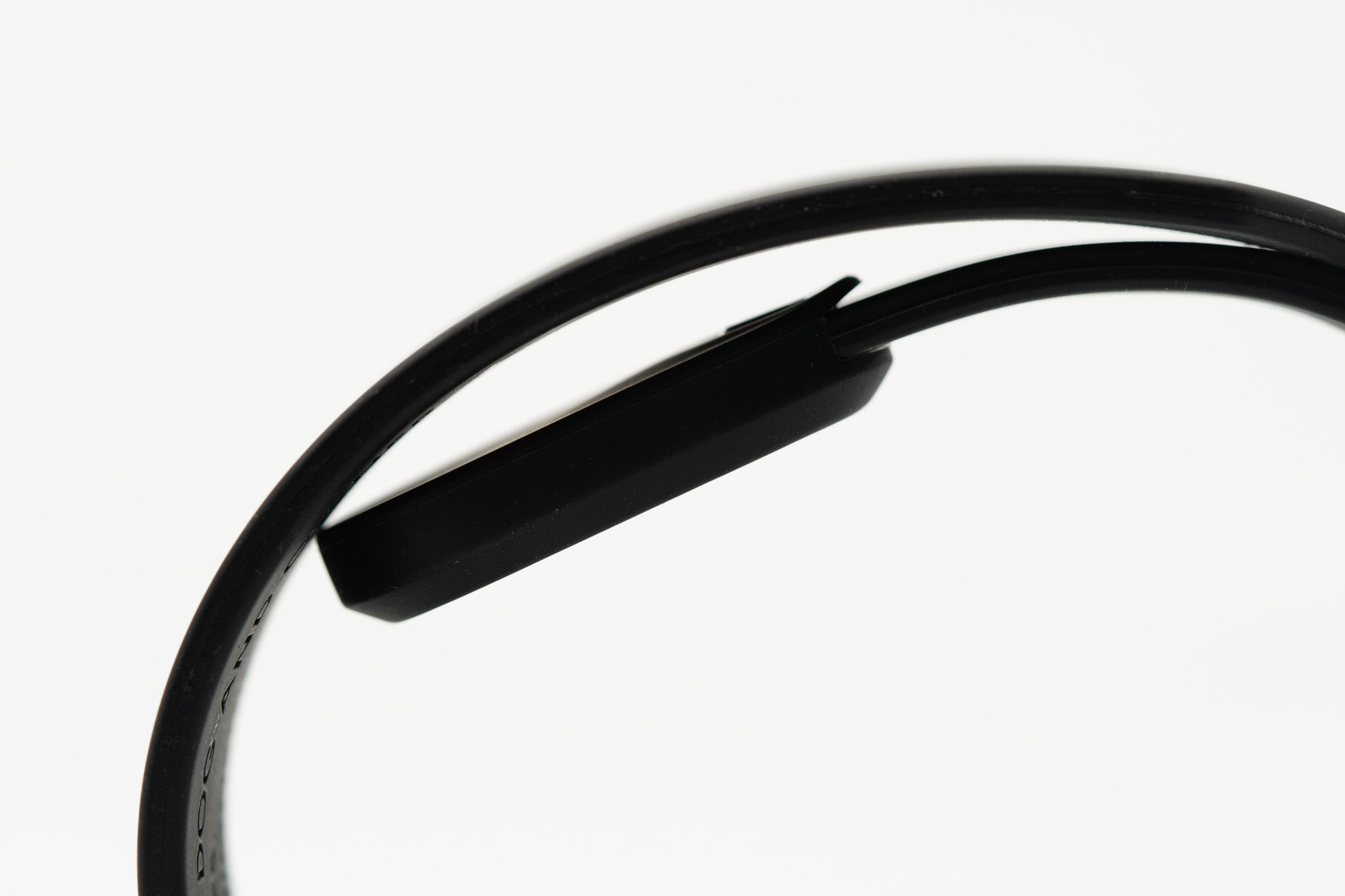Close-up of the Little Lupo AirTag Holder's attachment mechanism, showing how it seamlessly integrates with the Little Lupo collar for secure tracking.