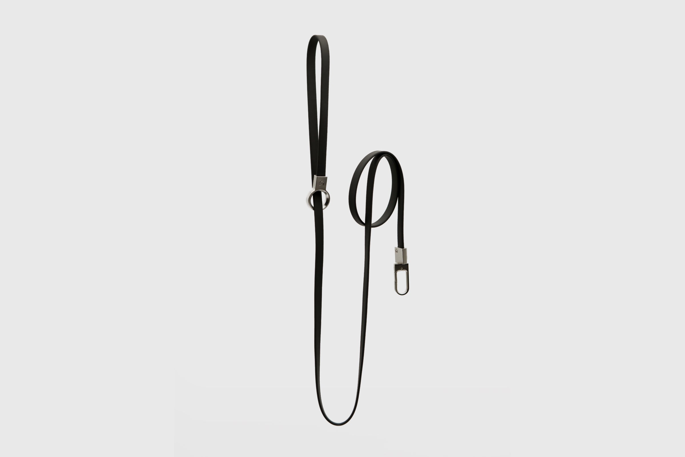 Full vertical view of the Little Lupo Leash L3, a sleek black 54-inch dog leash featuring a versatile slip handle and durable stainless steel hardware.